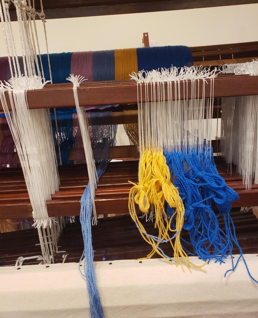 Loom being threaded